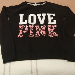 Worn maybe once. Black with pink lepoard on front